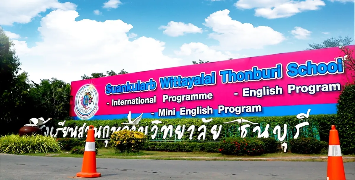 The Suankularb Wittayalai Thonburi School sign, listing the International Programme, English Program and Mini English Program